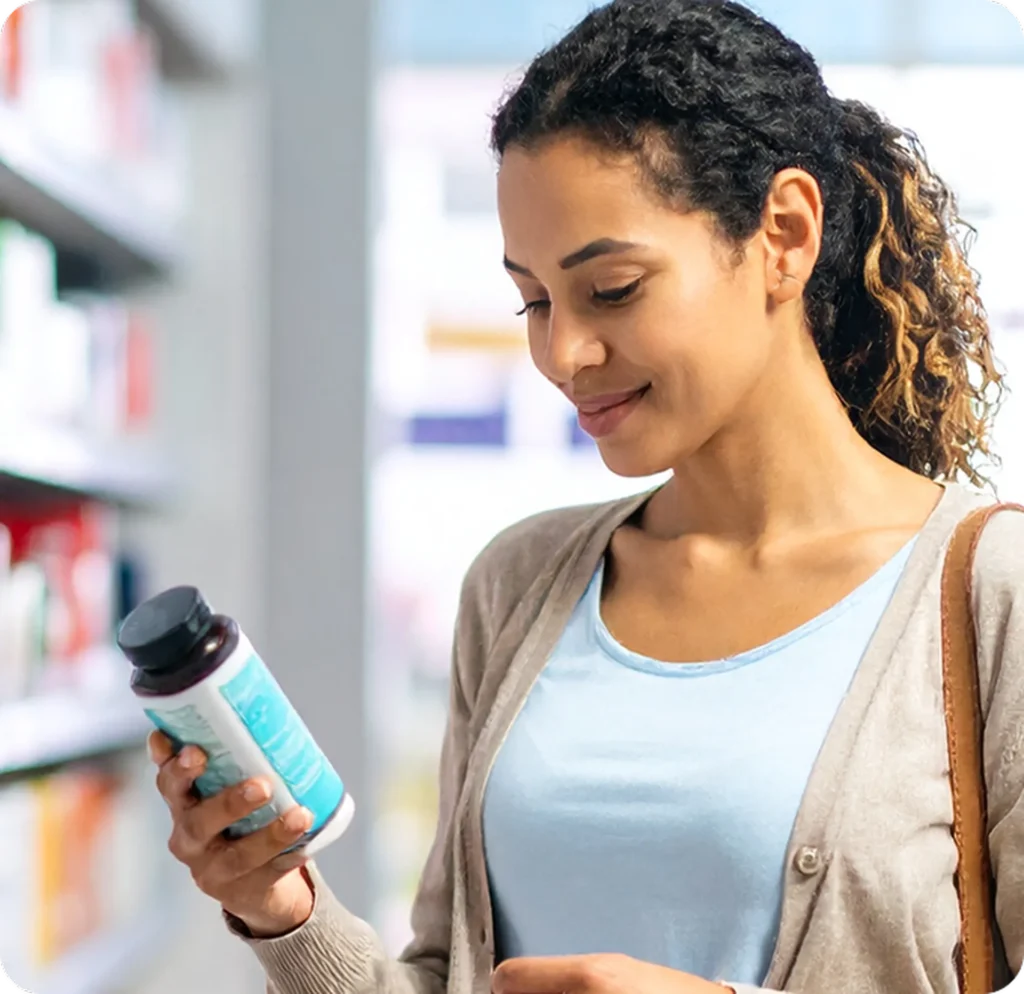 girl checking vitamins